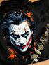 Détail impression portrait clown éclaboussures bleu orange t-shirt