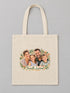 Visuel d’illustration – tote bag en coton naturel écru, à plat, vue de face, avec un portrait de famille fictive en style Portrait signature, texte « Famille Laurent »
