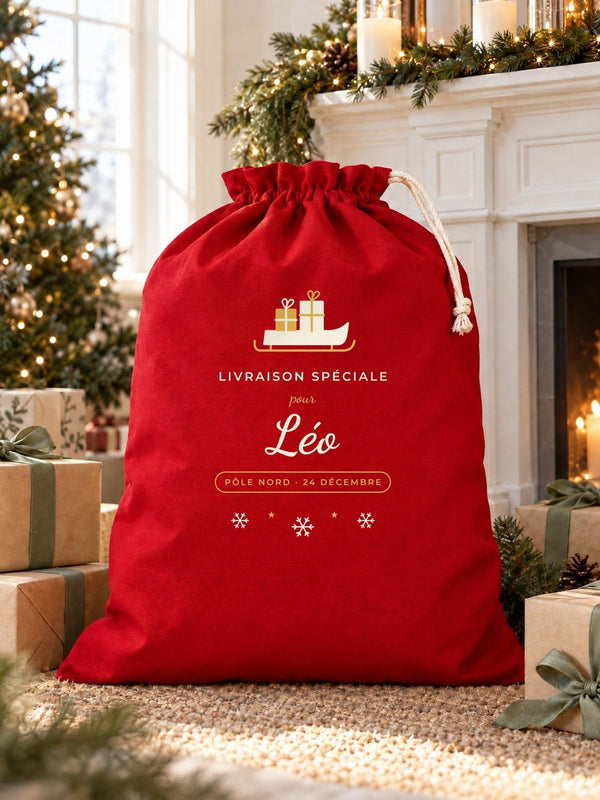 Visuel d’illustration – hotte de Noël rouge remplie de cadeaux près d’une cheminée décorée, avec le modèle « Livraison spéciale » au prénom Léo