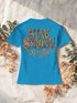 T-shirt femme bleu Atoll, motif floral vintage au dos, ambiance cocooning