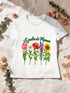 Visuel d’illustration – T-shirt femme blanc avec le design « Le jardin de Maman », exemple avec les prénoms Léa, Tom, Zoé, Jules et Inès