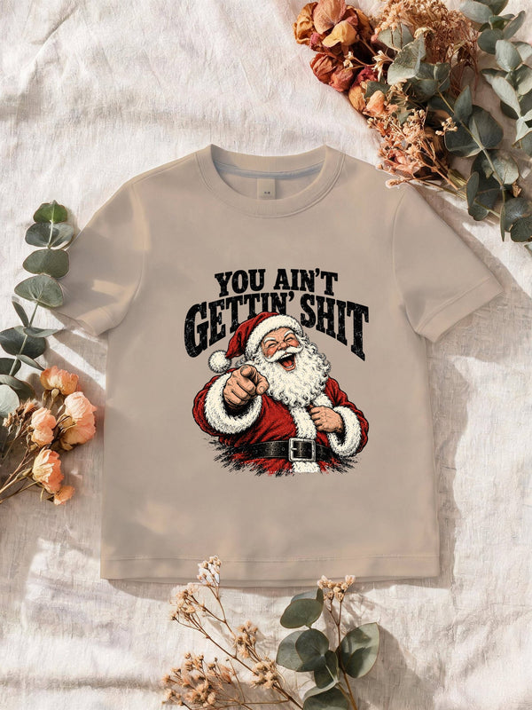 Visuel d’illustration – T-shirt homme sable avec le Père Noël hilare qui montre du doigt, avec sa phrase en anglais
