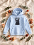 Sweat à capuche enfant bleu très clair personnalisé avec le portrait Majuscule chic détouré de Snikers.