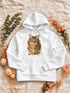 Sweat à capuche femme blanc personnalisé avec le portrait Signature détouré de Simba, présenté à plat.