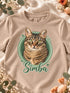Gros plan du portrait Cercle illustré de Simba imprimé sur un t-shirt enfant sable.